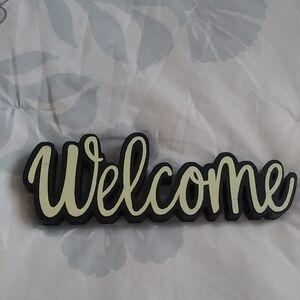Black and Cream Welcome Sign